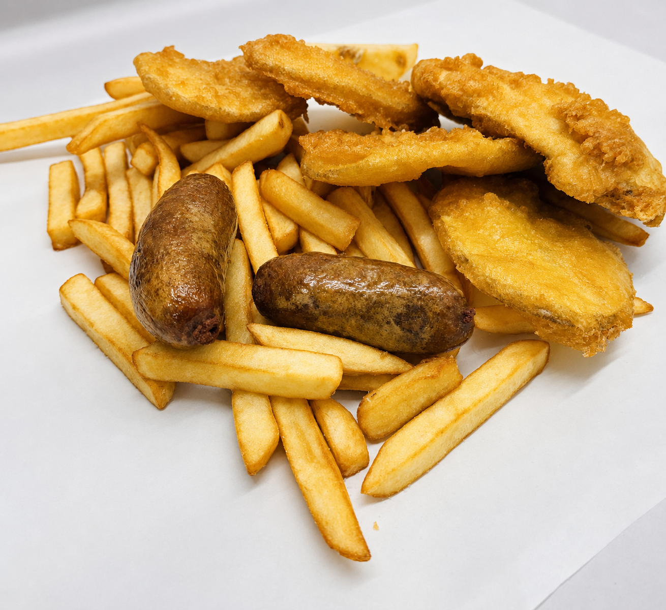 Chips, sausages, fresh made potato fritters and fish